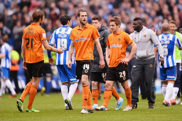 Wolves players react after being relegated to League One in 2013