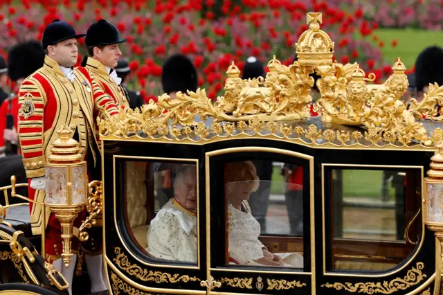 King Charles and Queen Consort Camilla travel in the Diamond Jubilee State Coach