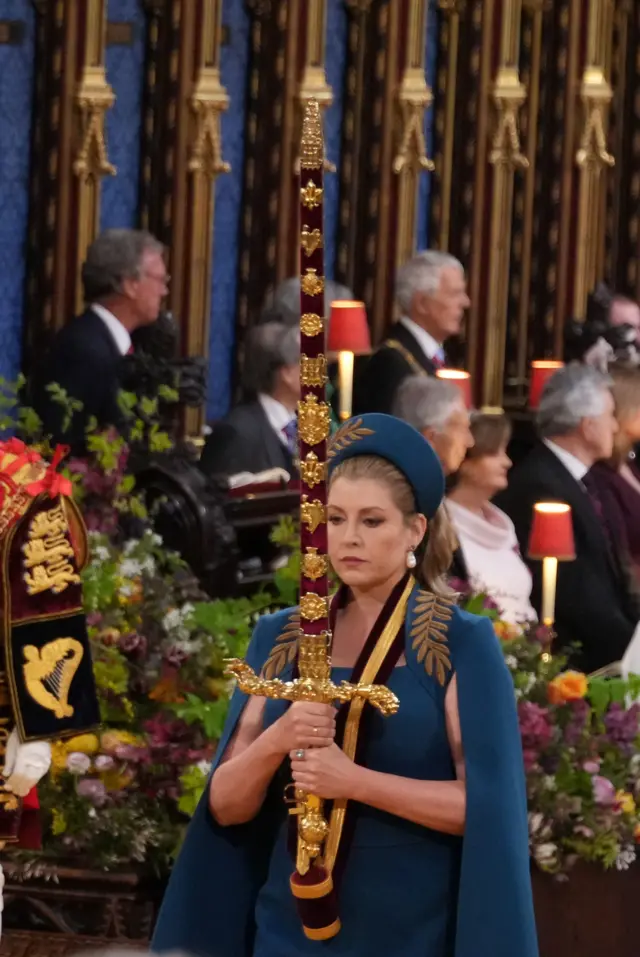 Lord President of the Council, Penny Mordaunt, carrying the Sword of State, in the procession through Westminster Abbey ahead of the coronation ceremony of King Charles III and Queen Camilla in London