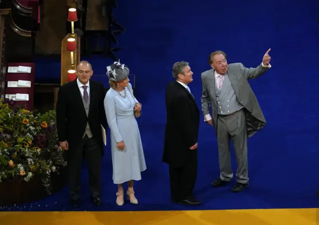 Lib Dem leader Sir Ed Davey, Labour leader Sir keir Starmer and Lord Andrew Lloyd Webber at the coronation of King Charles III and Queen Camilla at Westminster Abbey, London