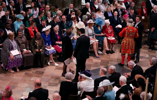 Guests arrive inside Westminster Abbey