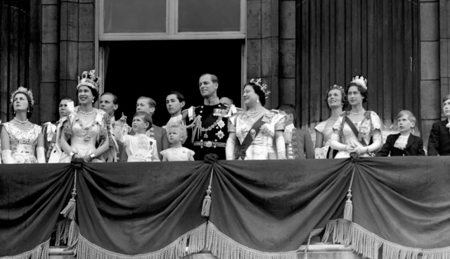 Queen Elizabeth II, Prince Charles, Princess Anne, the Duke of Edinburgh, the Queen Mother, and Princess Margaret on the balcony of Buckingham Palace to view the fly past of the Royal Air Force after the Coronation.