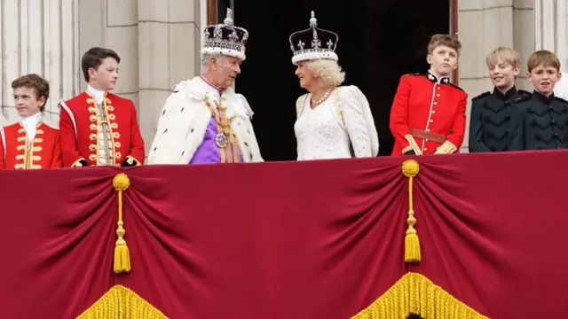 King and Queen on palace balcony