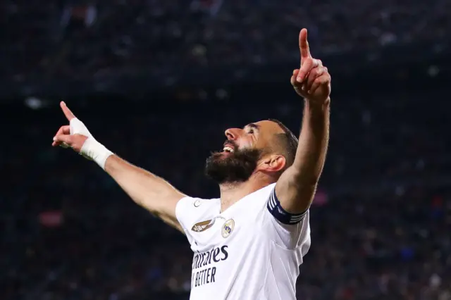 Real Madrid striker Karim Benzema celebrates after scoring against Barcelona in the Copa del Rey semi-final at the Nou Camp