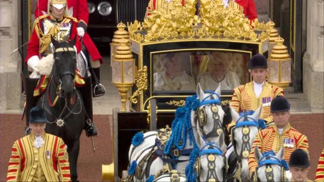 The King and Queen Consort in the state coach