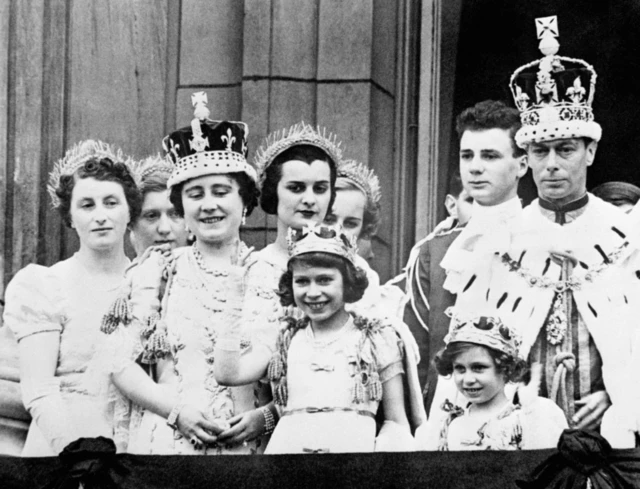 (Left to right) Queen Elizabeth (Queen Mother), Princess Elizabeth (Queen Elizabeth II), Princess Margaret and King George VI, after his coronation in 1937, on the balcony of Buckingham Palace, London.