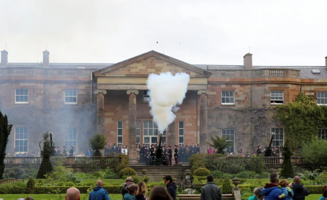 A shot is fired by members of the 206 (Ulster) Battery Royal Artillery at Royal Hillsborough Castle