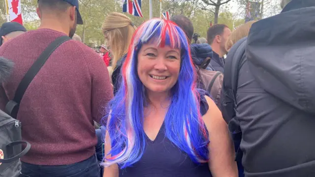 Heidi wears a red, white and blue wig