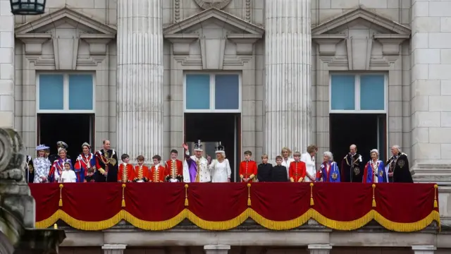 King Charles waves as Queen Camilla, Prince William, Catherine, Princess of Wales, and their children Prince George, Princess Charlotte and Prince Louis, Prince Edward, Duke of Edinburgh and Sophie, Duchess of Edinburgh stand on the Buckingham Palace balcony