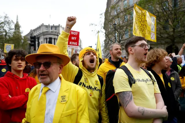 Anti-monarchy demonstrators shout slogans