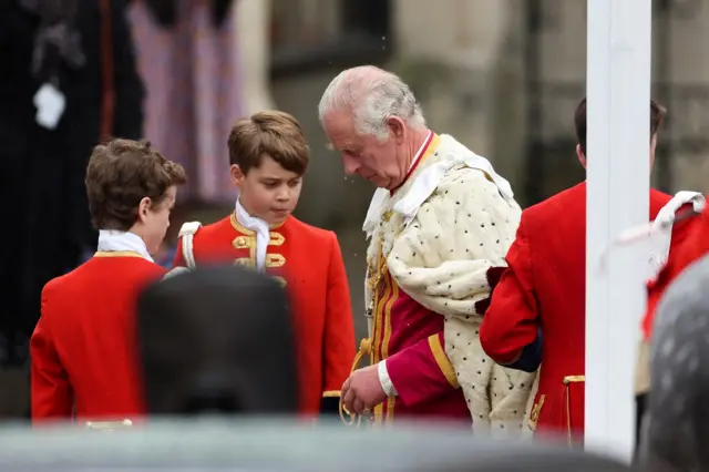 Britain's King Charles and Prince George stand during the coronation ceremony at Westminster Abbey