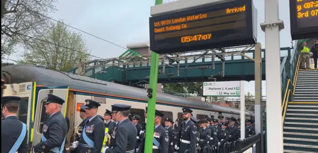 RAF personnel board the train to London at Tring