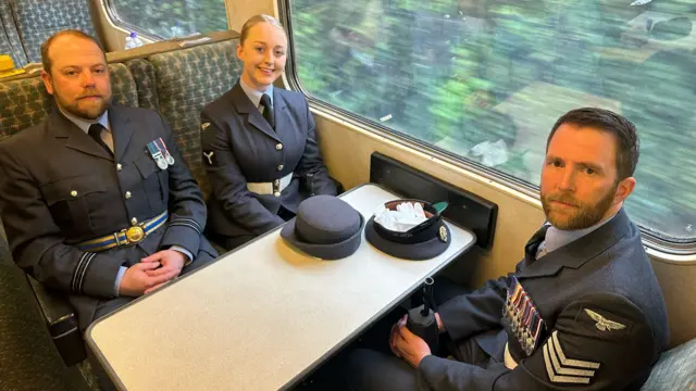 Tom, Hannah and Michael on the train