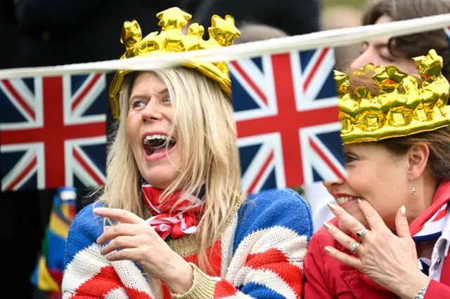 Women wearing a crowns enjoy the day at The Big Lunch at The Long Walk