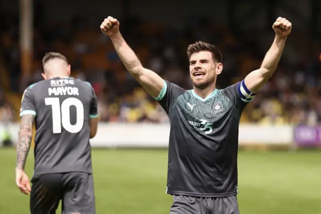 Joe Edwards celebrates giving Plymouth the lead at Port Vale