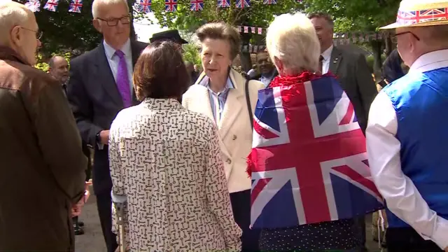 Princess Anne chatting to locals