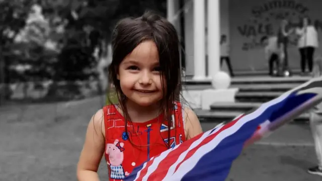 Esmee with a flag