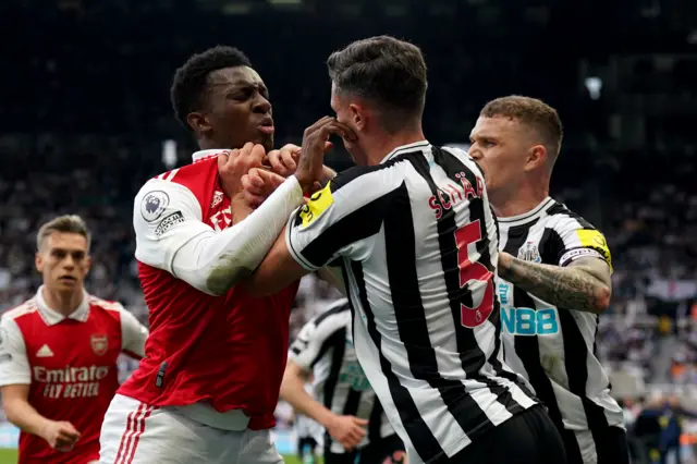 Newcastle United’s Fabian Schar (right) and Arsenal’s Edward Nketiah