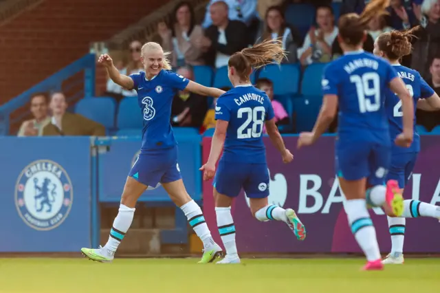 Chelsea's Pernille Harder (left) celebrates scoring their side's third goal of the game with team-mates during the Barclays Women's Super League match at Kingsmeadow, London.