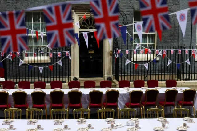 A general view shows decorations and tables for The Big Lunch event on Downing Street