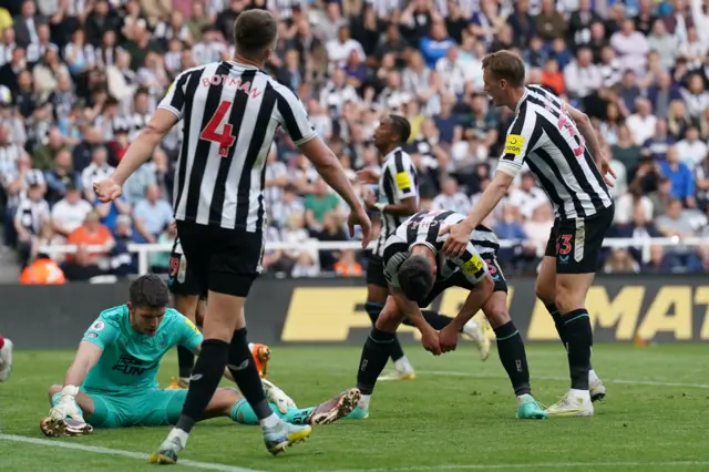 Fabian Schar (second from right) reacts after scoring an own goal