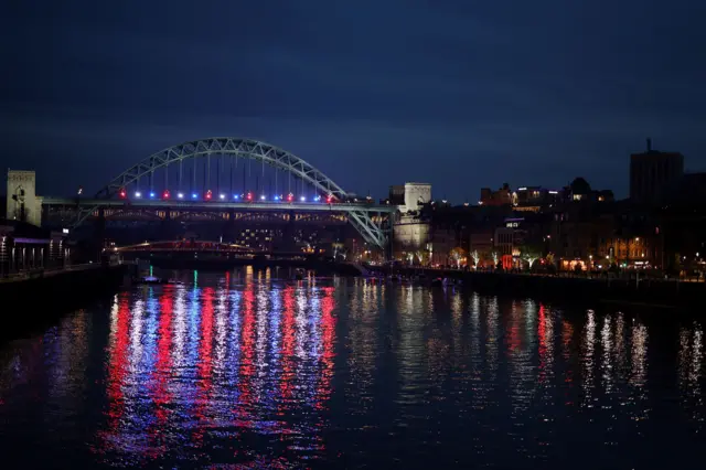 Water reflecting the lights on the Tyne Bridge