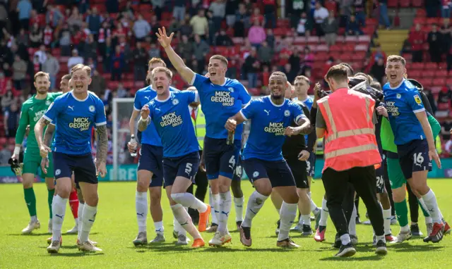 Peterborough celebrate winning the play-offs