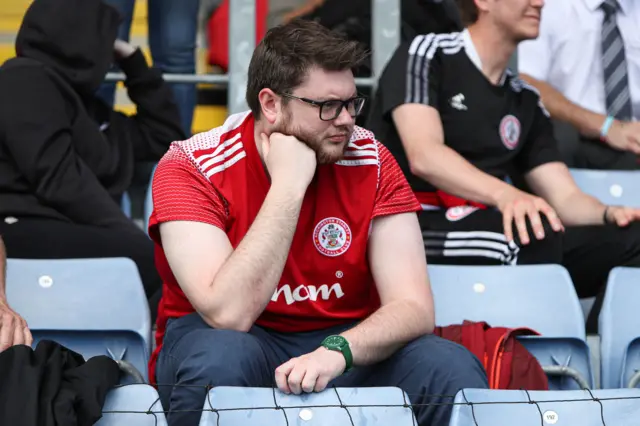 An Accrington fan following their relegation from League One