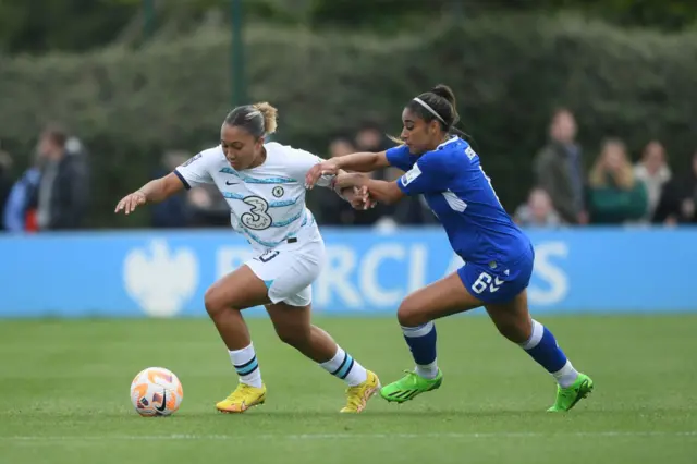 Lauren James of Chelsea is challenged by Gabrielle George of Everton during the FA Women's Super League match between Everton FC and Chelsea at Walton Hall Park on October 16, 2022 in Liverpool, England.