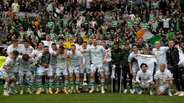 Celtic celebrate in front of the away fans at Tynecastle