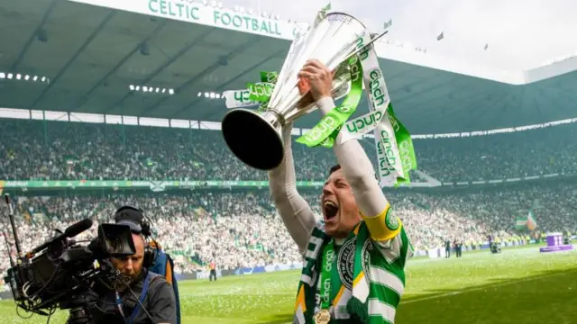 Callum McGregor celebrates last season's title