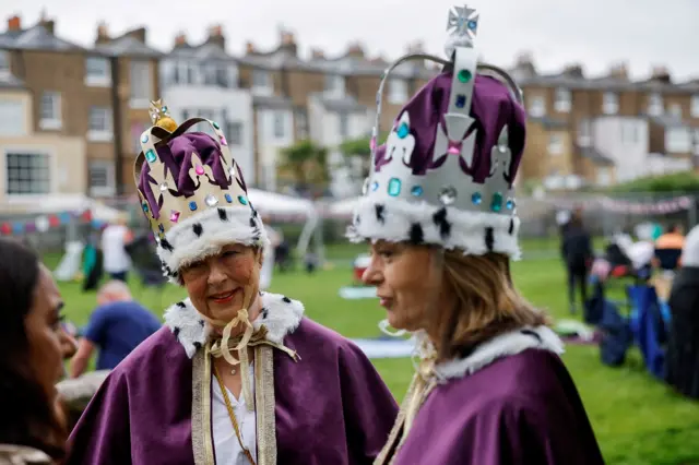 Two women wear crowns in Windsor