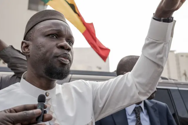 Senegal's opposition leader and presidential candidate Ousmane Sonko addresses his supporters as he went to court to attend the hearing, on March 16, 2023 in Dakar, Senegal.