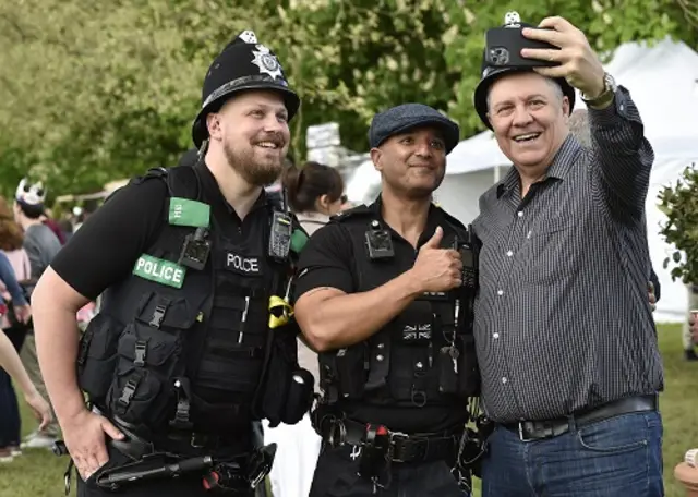 Two police officers with a resident