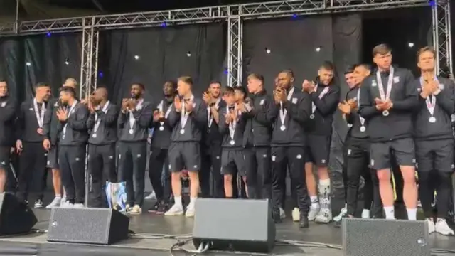 Ipswich Town players applaud the fans