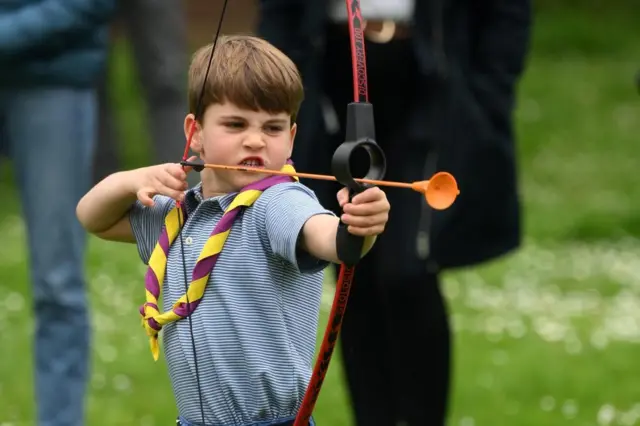 Prince Louis has a go at archery