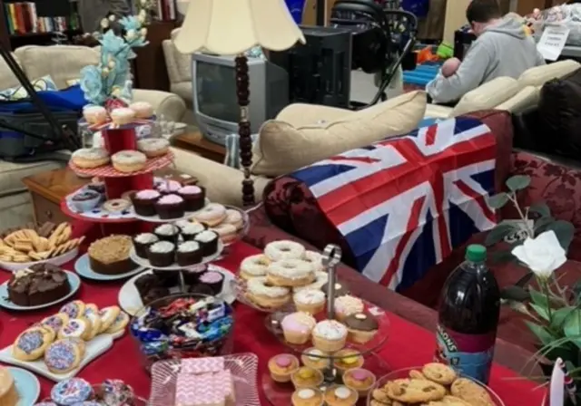 Cakes, biscuits and bunting on display at the Age UK shop