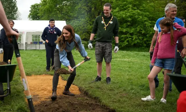 The Princess of Wales help to reset a path at a Scouts hut in Slough