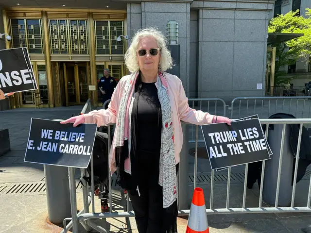 A few protestors gathered outside the New York City courthouse as closing arguments are underway