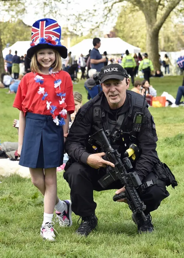 A child with a police officer