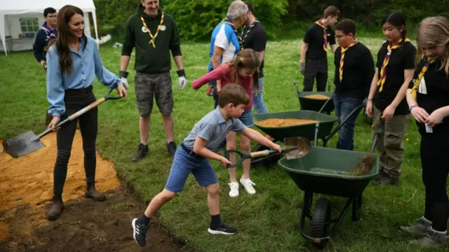 Princess Charlotte, Prince Louis and the Princess of Wales join volunteers to help renovate and improve the 3rd Upton Scouts Hut in Slough, as part of the Big Help Out, to mark the crowning of King Charles III and Queen Camilla