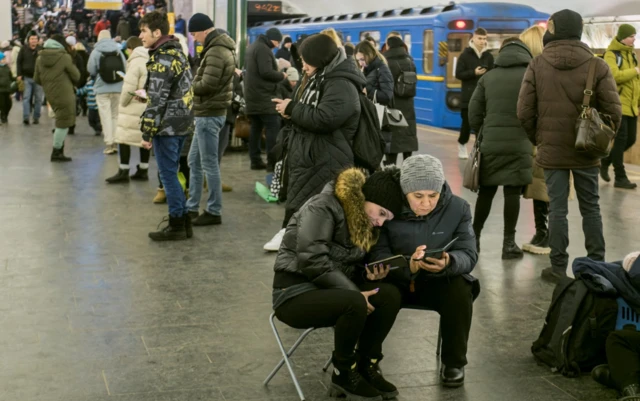 People take shelter in a Kyiv metro