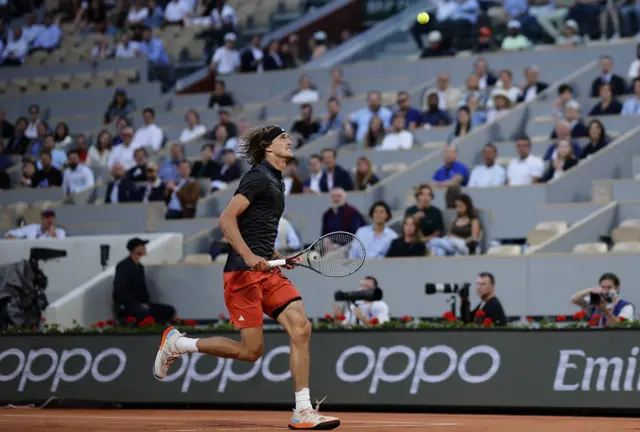 Alexander Zverev runs to hit the ball