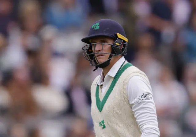 Peter Moor of Ireland walks off after being dismissed by England's Stuart Broad at Lord's