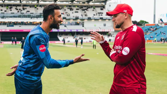 Captains shake hands at the toss