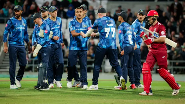 Ben Mike celebrates wicket