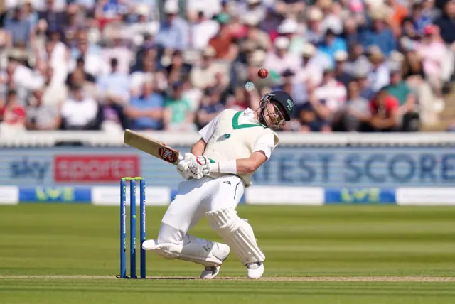 Ireland's Mark Adair ducks under a short ball as he bats during day one of the first LV= Insurance Test match at Lord's, London