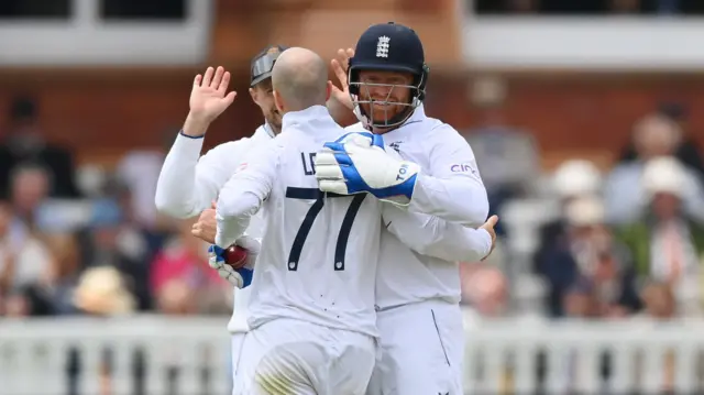 Jack Leach celebrates with Jonny Bairstow after dismissing Paul Stirling