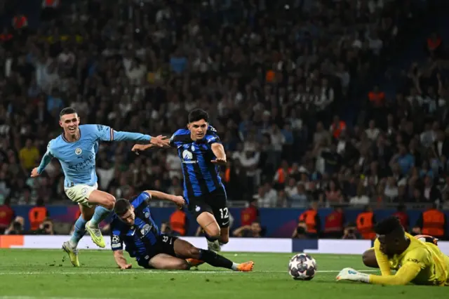 Phil Foden shoots straight at Andre Onana