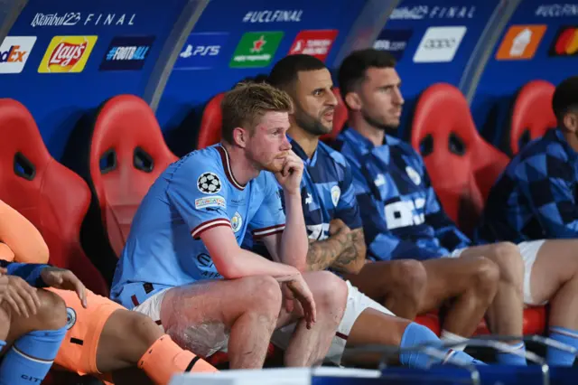 Kevin de Bruyne sat on the Manchester City bench